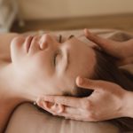 A Woman Having a Head Massage